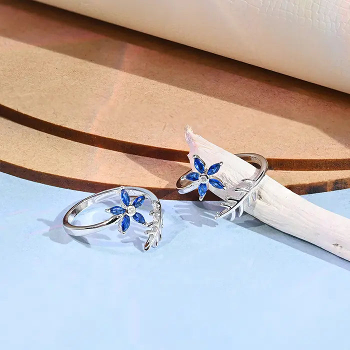 Astro theme engagement rings-Floral Blue Stone Toe Rings