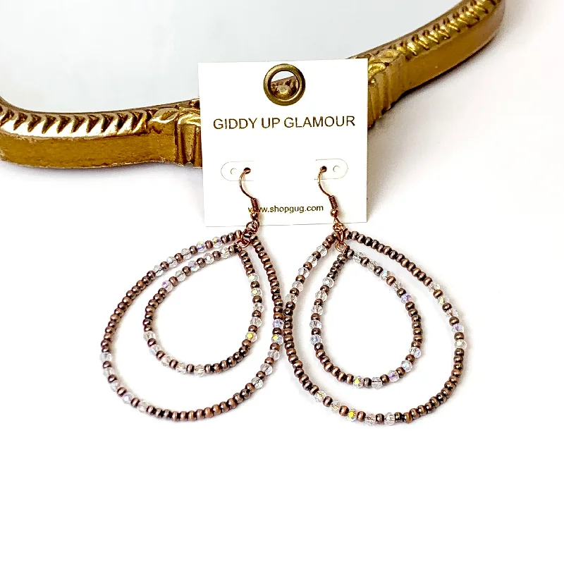 Bright crystal earrings-Layered Faux Navajo Pearl Beaded Teardrop Earrings with Clear Glass Spacers in Copper Tone