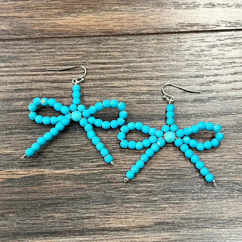 Light clay earrings-Handmade Faux Turquoise Bow Earrings