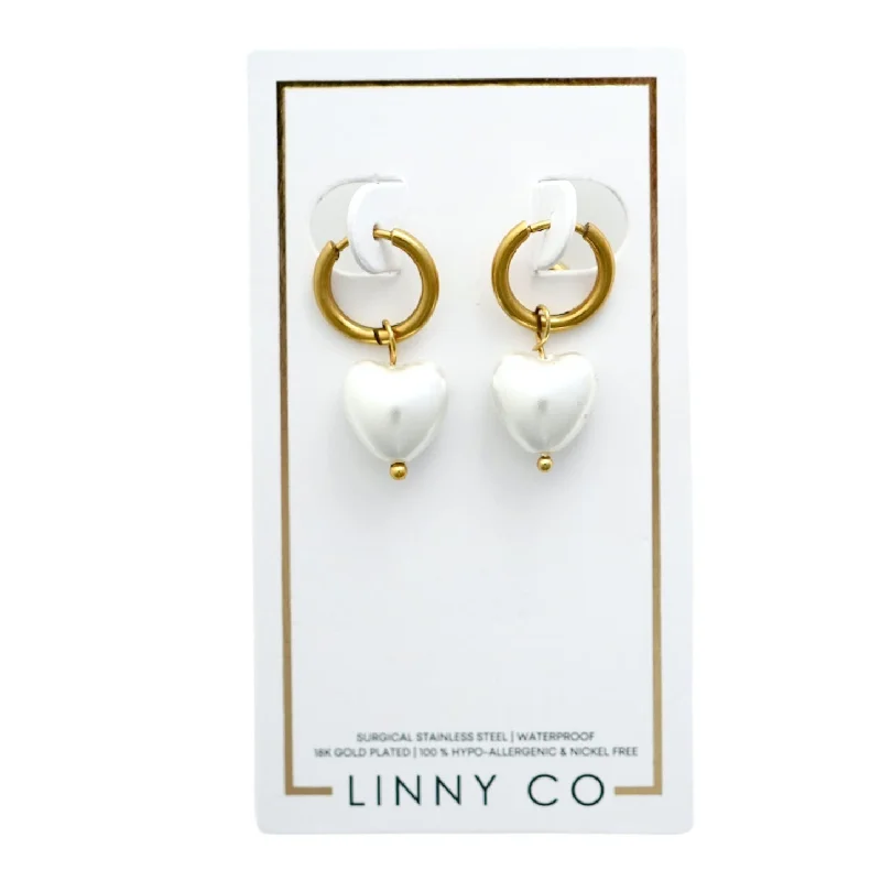 Polished bead earrings-Linny Co | Willa Gold Tone Huggie Hoops with Dangling Heart Pearls