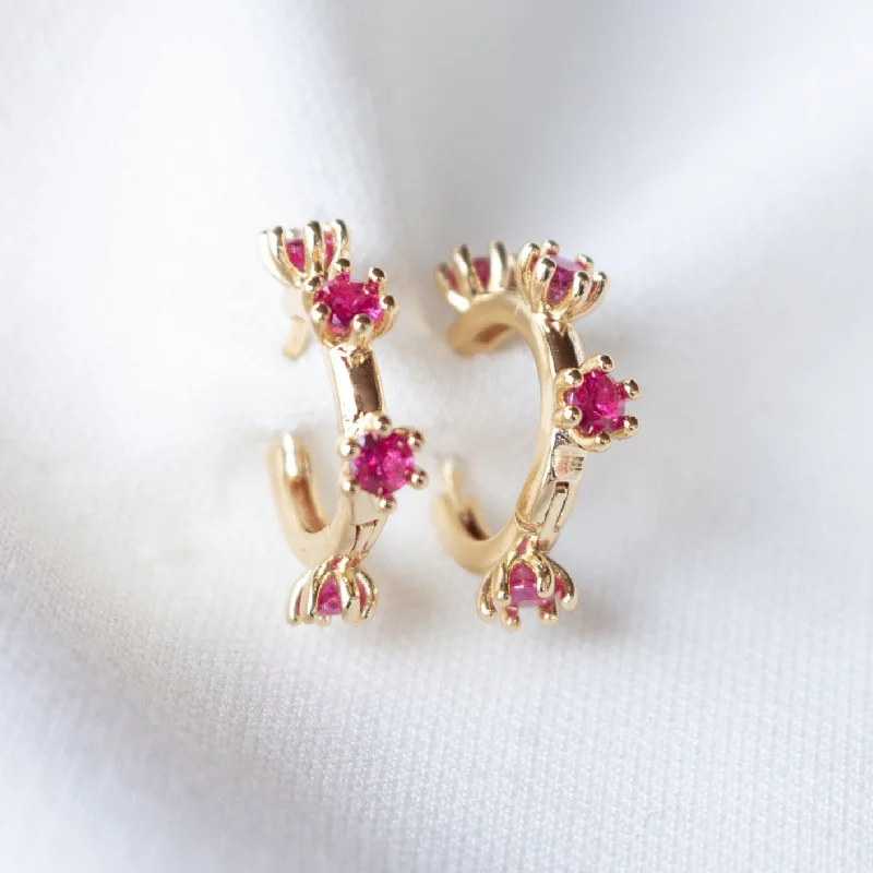 Coiled cord earrings-Kinsey Designs | Mae Gold Tone Huggie Hoop Earrings with Fuchsia Pink CZ Crystal Accents