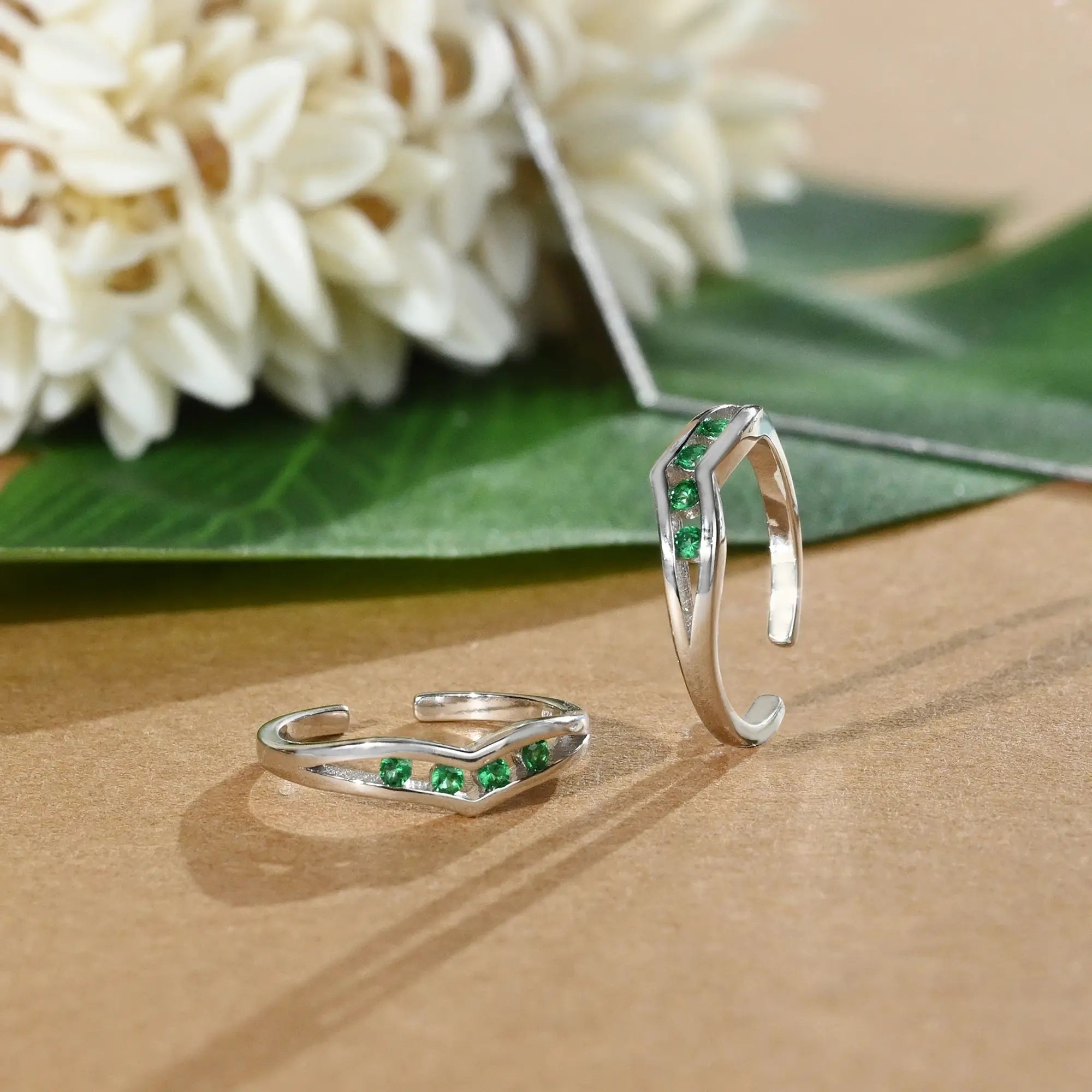 Surf theme engagement rings-Sparkle Green Stone Toe Rings