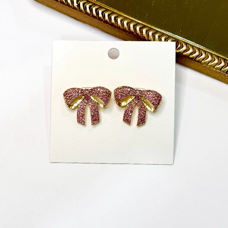 Rustic flair earrings-Twinkling Treasure Gold Tone Pink Rhinestone Bow Stud Earrings