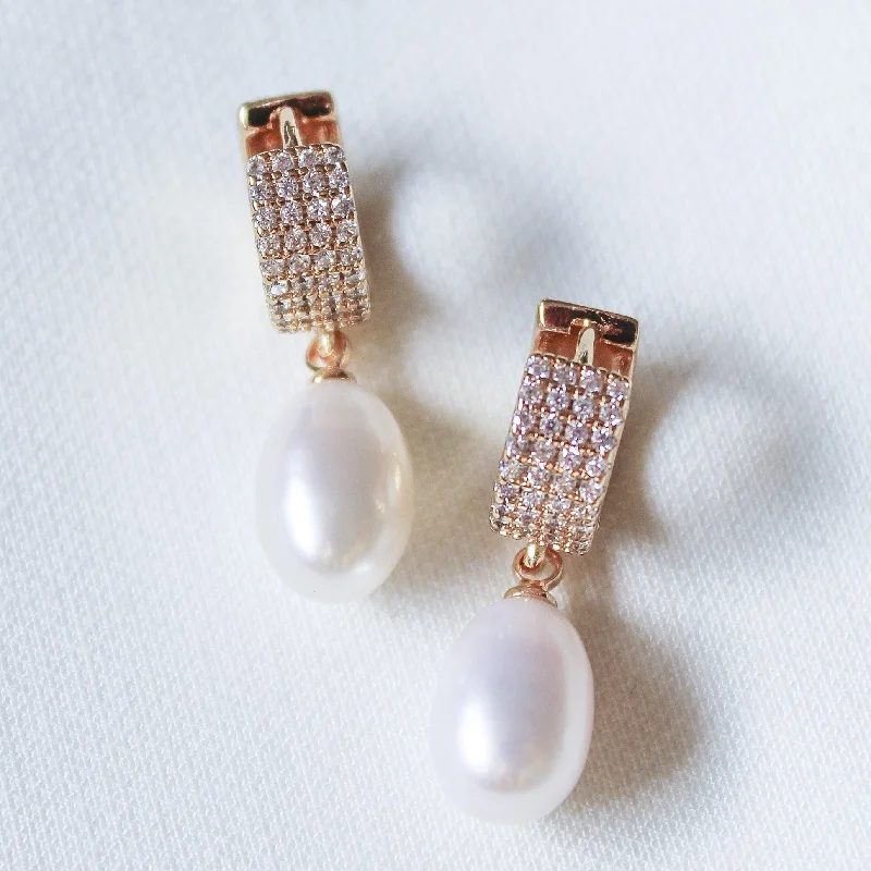 Half moon earrings-Kinsey Designs | Gemma Gold Tone Huggie Hoop Earrings with Pearl Drops